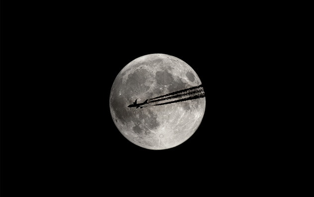 jeff strobel: lunar transit (airliner transiting the moon - boston, massachusetts)