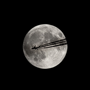 jeff strobel: lunar transit (airliner transiting the moon - boston, massachusetts)